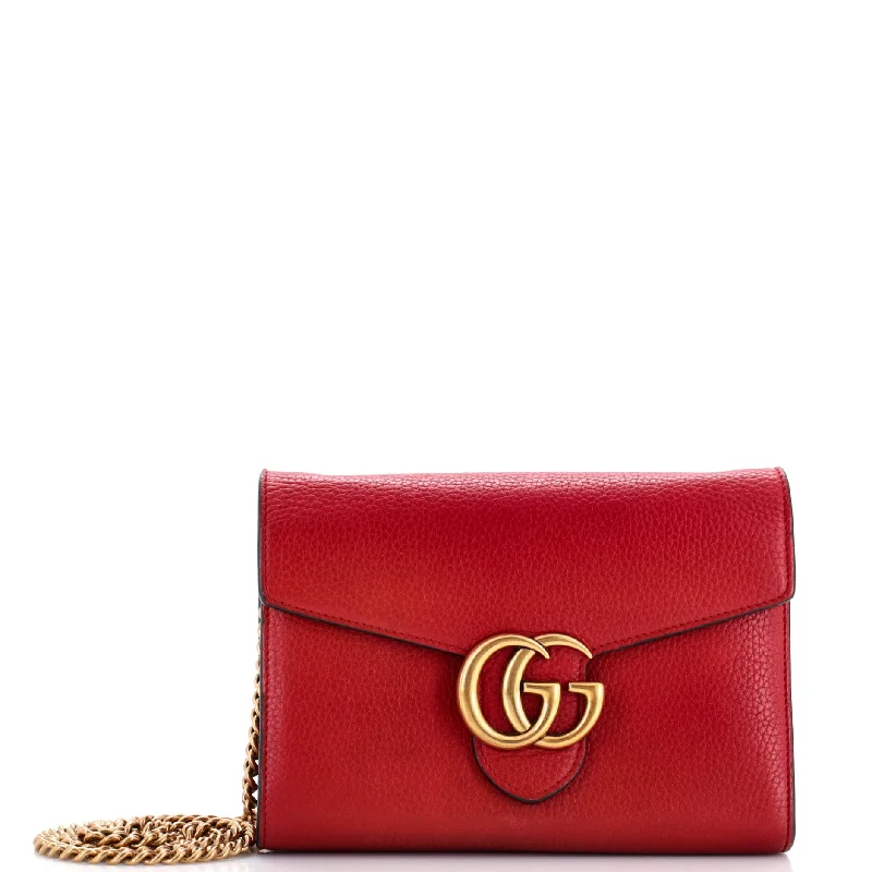 Women Gucci Sylvie bags featuring the signature web stripeGG Marmont Chain Wallet Leather Mini