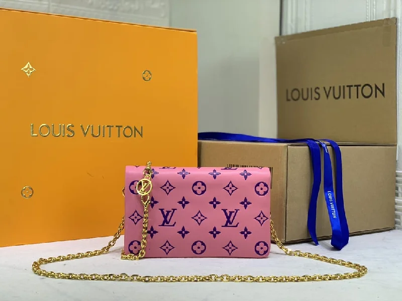 Ladies Louis Vuitton Petite Malle bags in a pastel color for a soft lookLouis Vuitton Coussin Handbag