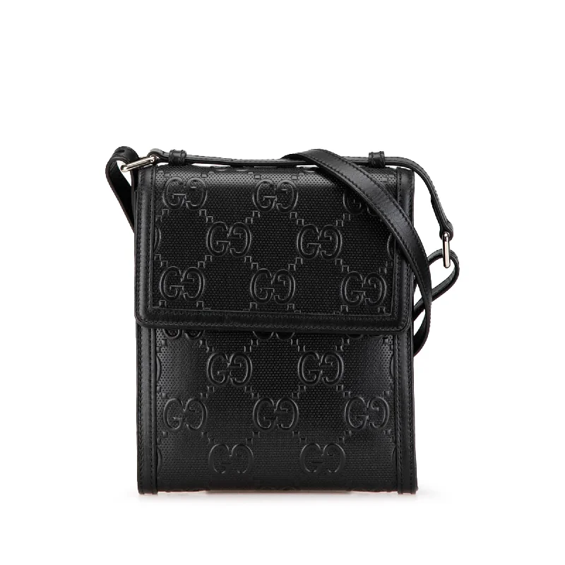 Women Gucci bags with a magnetic snap closure for easy accessBlack Gucci GG Embossed Flap Crossbody