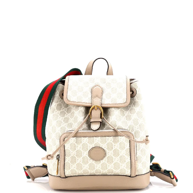 Ladies Gucci shoulder bags with a magnetic - closure flapInterlocking G Patch Drawstring Flap Backpack GG Coated Canvas Small