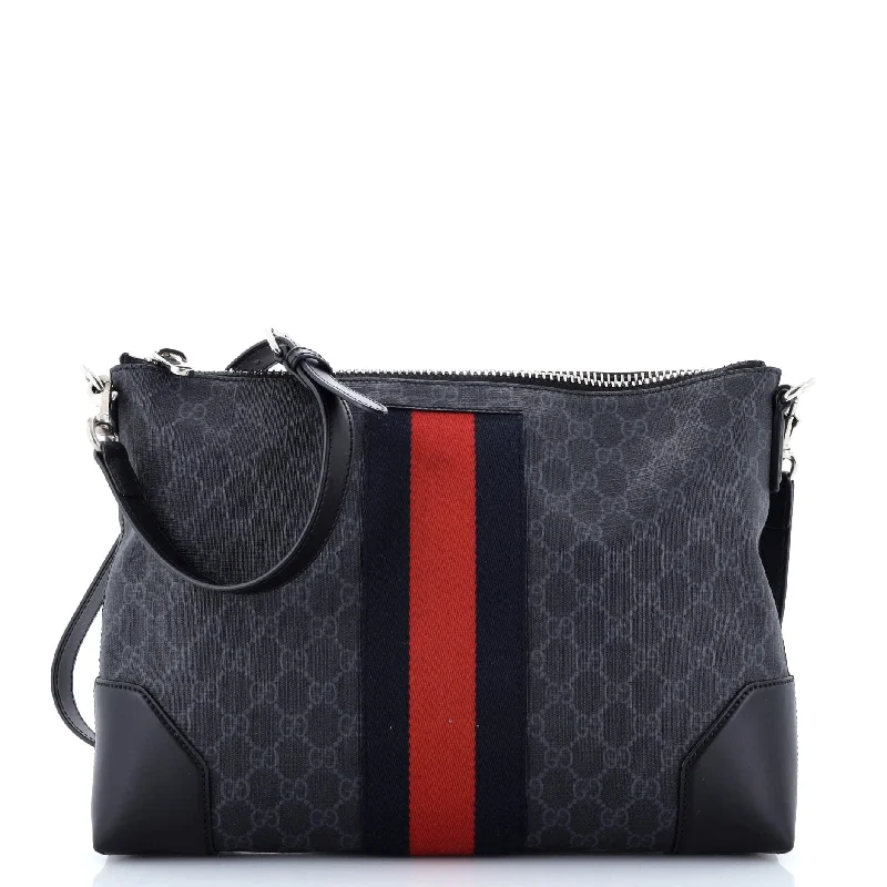 Ladies Gucci shoulder bags with a magnetic - closure flapWeb Zip Flat Messenger GG Coated Canvas Medium