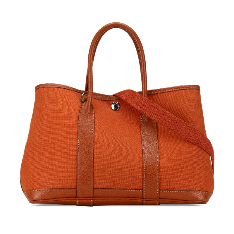 Durable Hermes Canvas - Trimmed Bags for Outdoor UseOrange Hermès Toile and Negonda Garden Party 30 Satchel