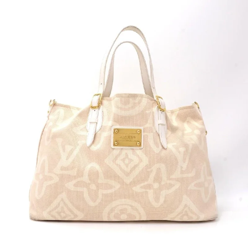 Ladies Louis Vuitton Petite Malle bags in a pastel color for a soft lookTahitienne Cabas GM Monogram Cotton Handbag