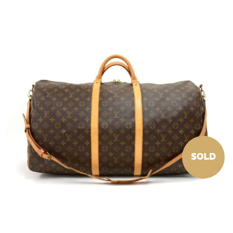 Louis Vuitton bags with a snap - button closure and a decorative charm for styleKeepall 60 Bandouliere Monogram Canvas Travel Bag with Strap