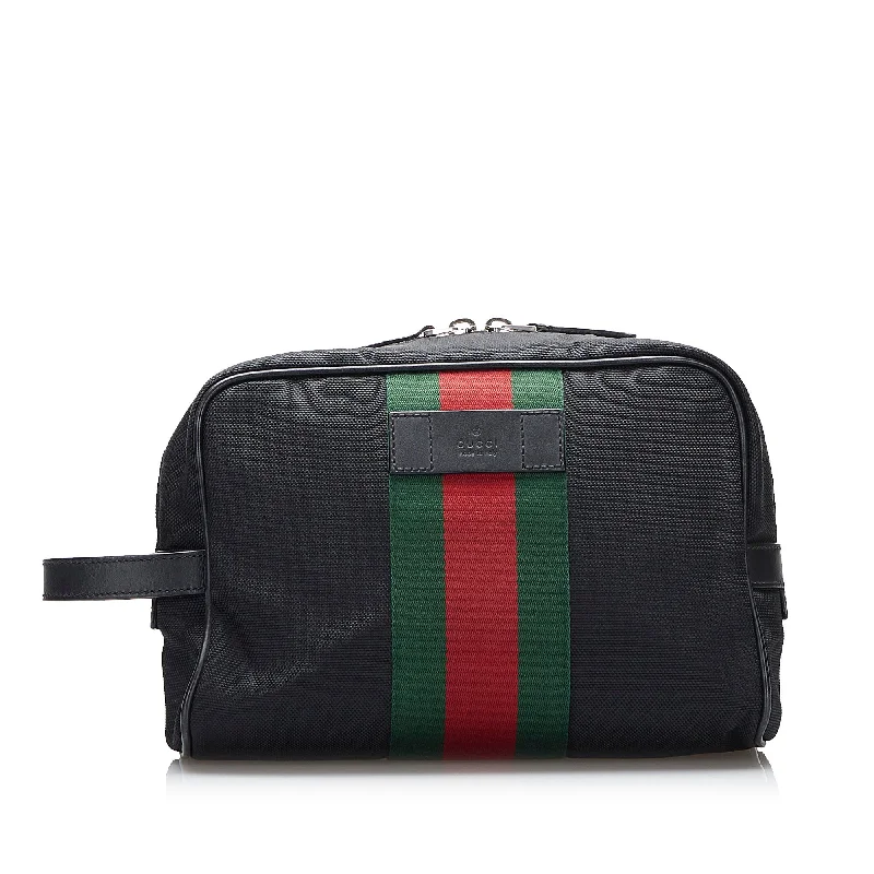 Women Gucci bags with interlocking G hardware for a classic lookBlack Gucci Techno Web Clutch