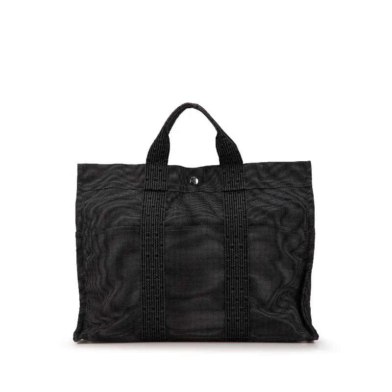 Travel - Approved Hermes Carry - on Bags with TSA - Friendly FeaturesGray Hermès Herline Tote MM