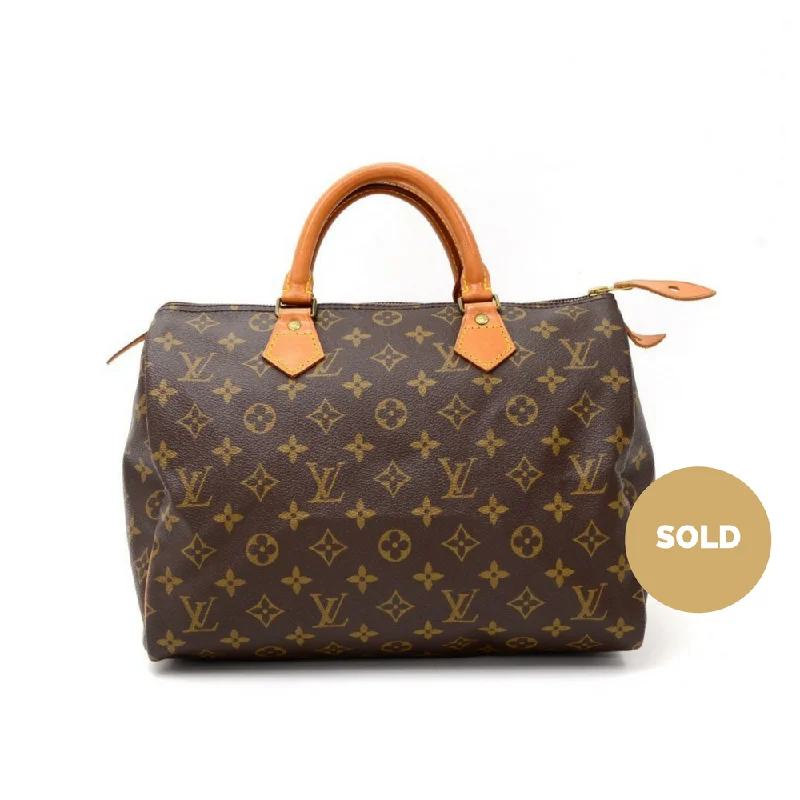 Louis Vuitton bags with a chain - link trim and a leather body for a modern edgeSpeedy 30 Monogram Canvas Handbag