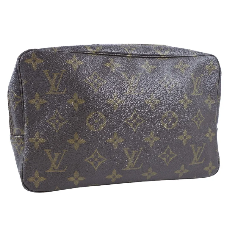 Louis Vuitton bags with a magnetic snap closure for easy accessLouis Vuitton Brown Canvas Trousse de Toilette clutch bag