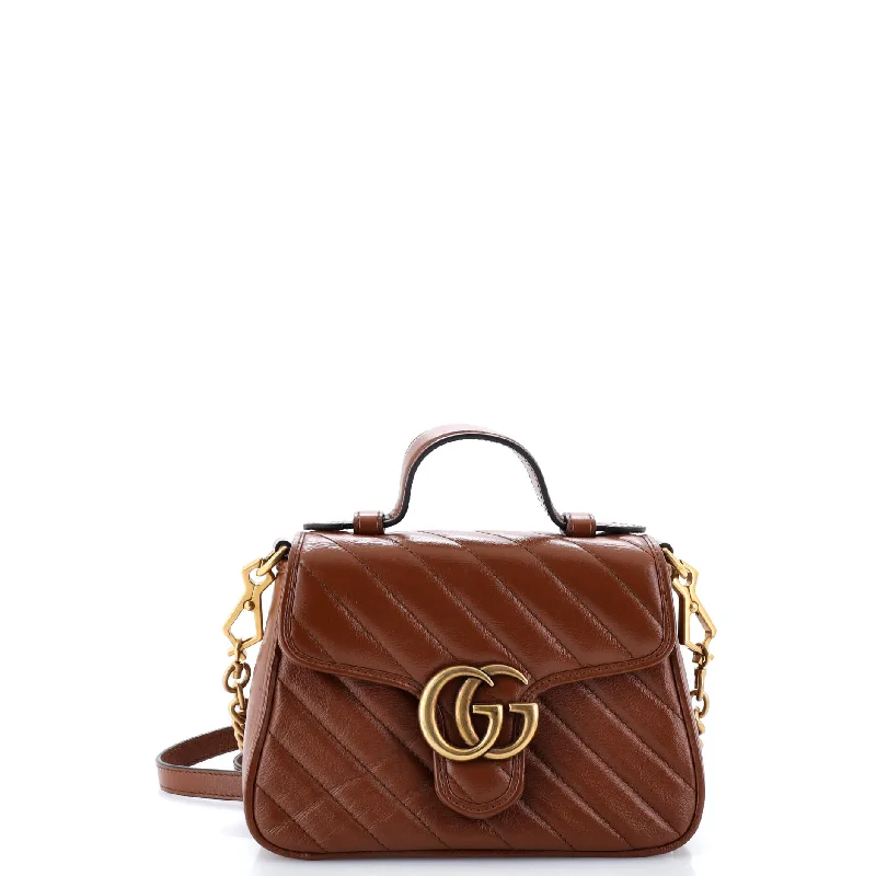 Ladies Gucci shoulder bags with a single - handle designGG Marmont Top Handle Flap Bag Matelasse Leather Mini