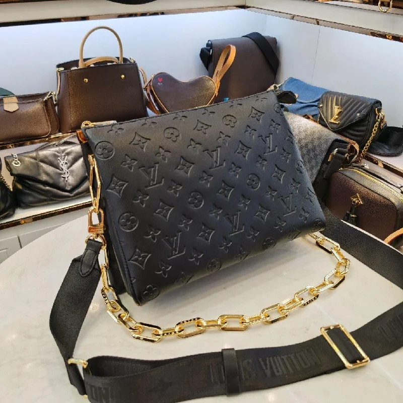 Louis Vuitton bags with a snap - button closure and a decorative charm for styleLouis Vuitton Coussin MM Bag