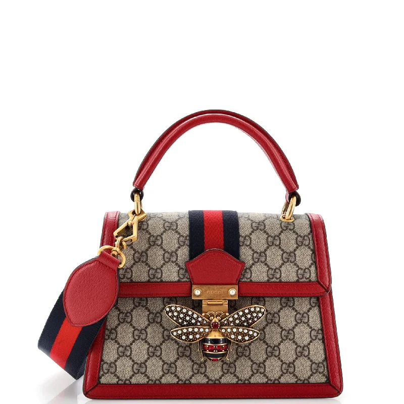 Women Gucci Sylvie bags featuring the signature web stripeQueen Margaret Top Handle Bag GG Coated Canvas Small