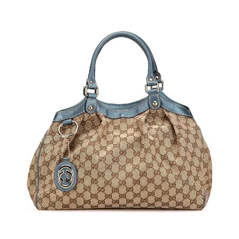 Women Gucci Sylvie bags with a crystal - embellished web stripeBrown Gucci GG Canvas Sukey Tote