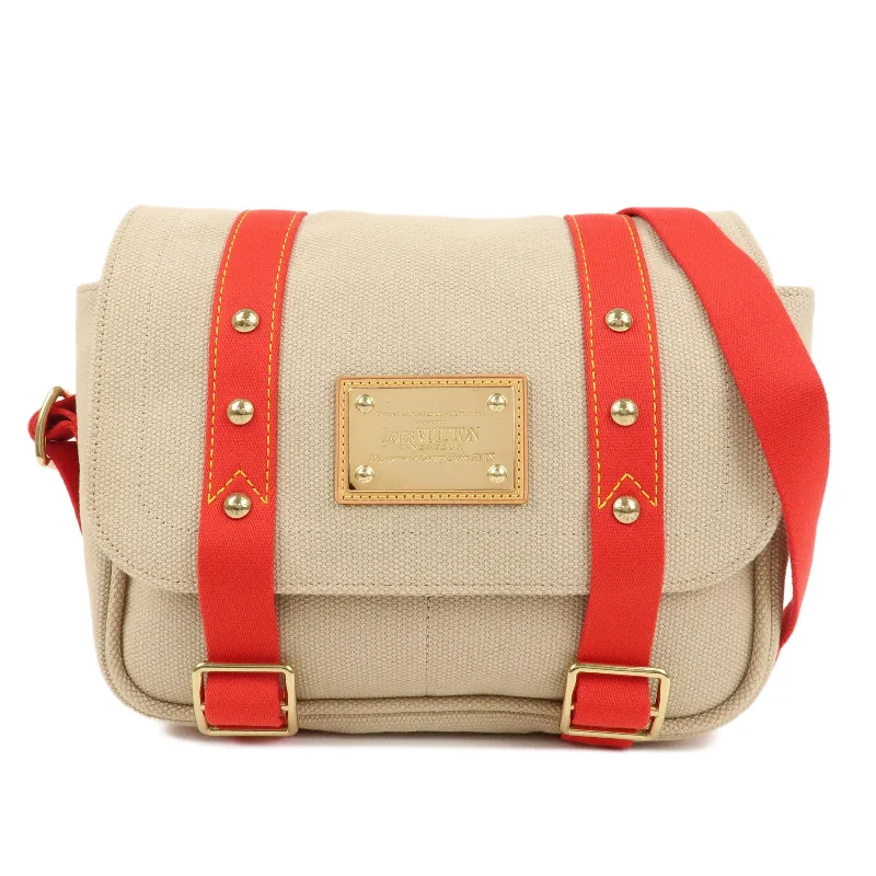 Louis Vuitton bags with a front - flap pocket for quick - access itemsLOUIS VUITTON Antigua Buzas PM Shoulder Bag Beige Red M40041