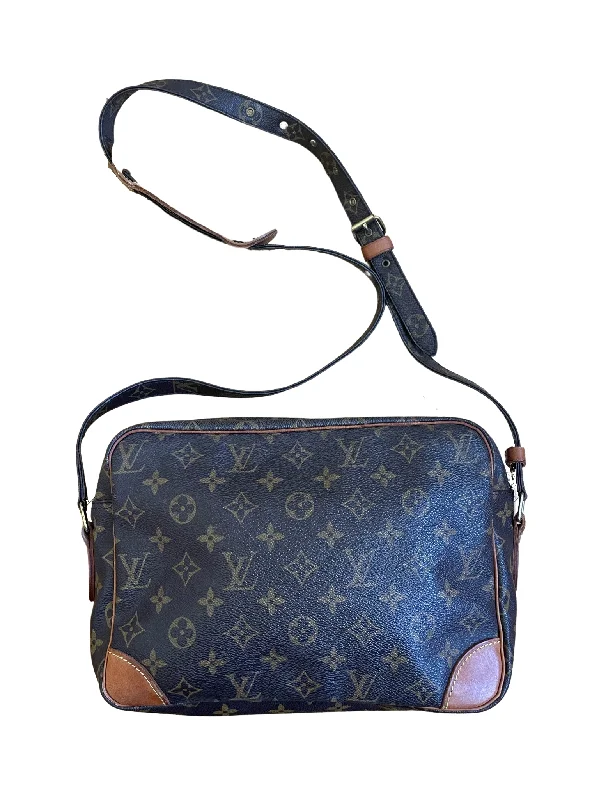 Louis Vuitton handbags with a patent - leather finish for a shiny lookLouis Vuitton Nil MM Monogram