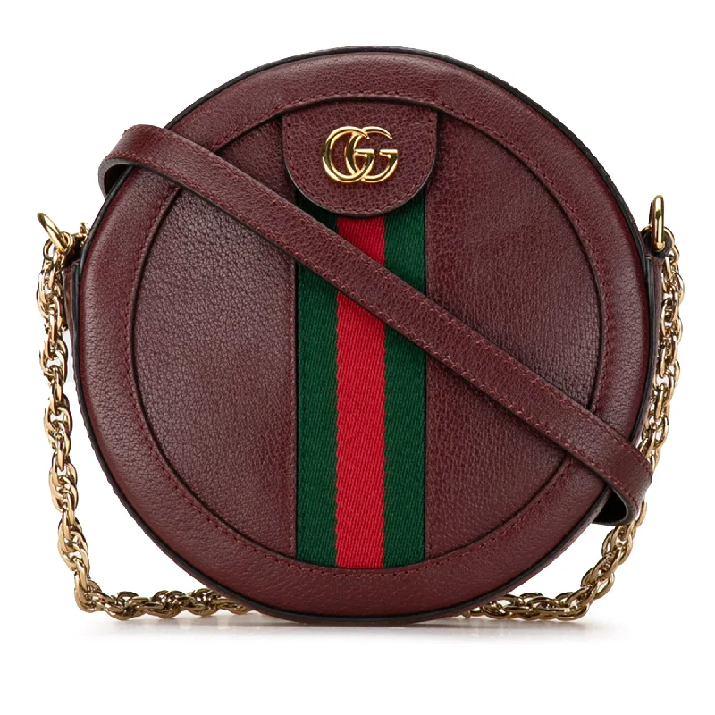 Women Gucci crossbody bags in a bold red colorRed Gucci Mini Round Ophidia Leather Crossbody Bag