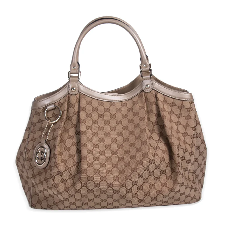 Women Gucci Sylvie bags with a crystal - embellished web stripeGucci GG Large Sukey Tote Bag