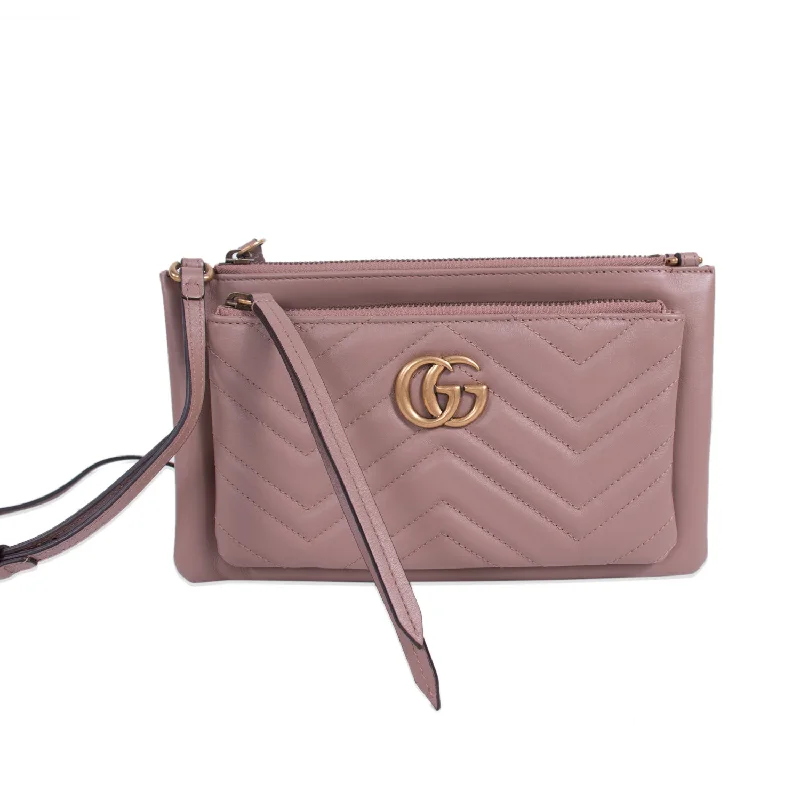 Women Gucci bags with a snap - button closure and a decorative charmGucci GG Marmont Mini Cross Body Bag