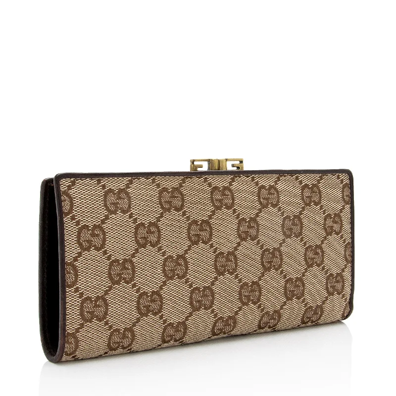 Women Gucci Sylvie bags featuring the signature web stripeGucci GG Canvas Kiss Lock Continental Wallet (SHF-xUmEf6)