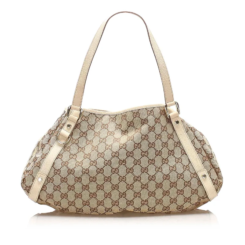 Gucci tote bags for women with a printed Gucci logoGucci GG Canvas Pelham Tote Bag (SHG-15679)