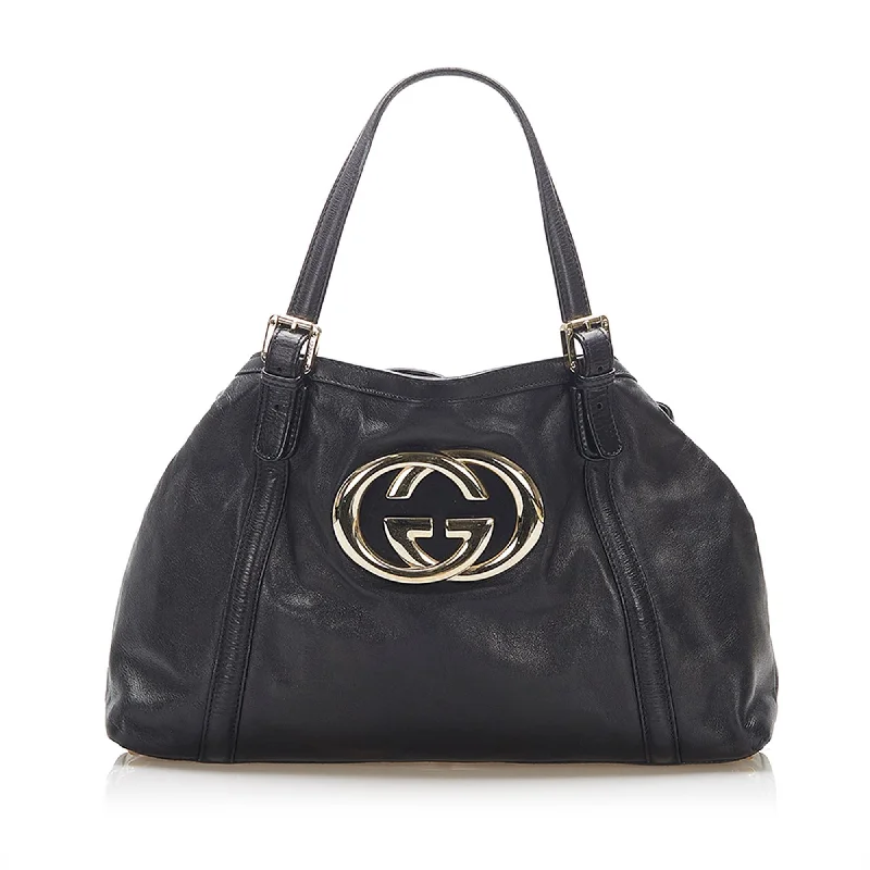 Women Gucci bags with interlocking G hardware for a classic lookGucci Britt Leather Tote Bag (SHG-16275)