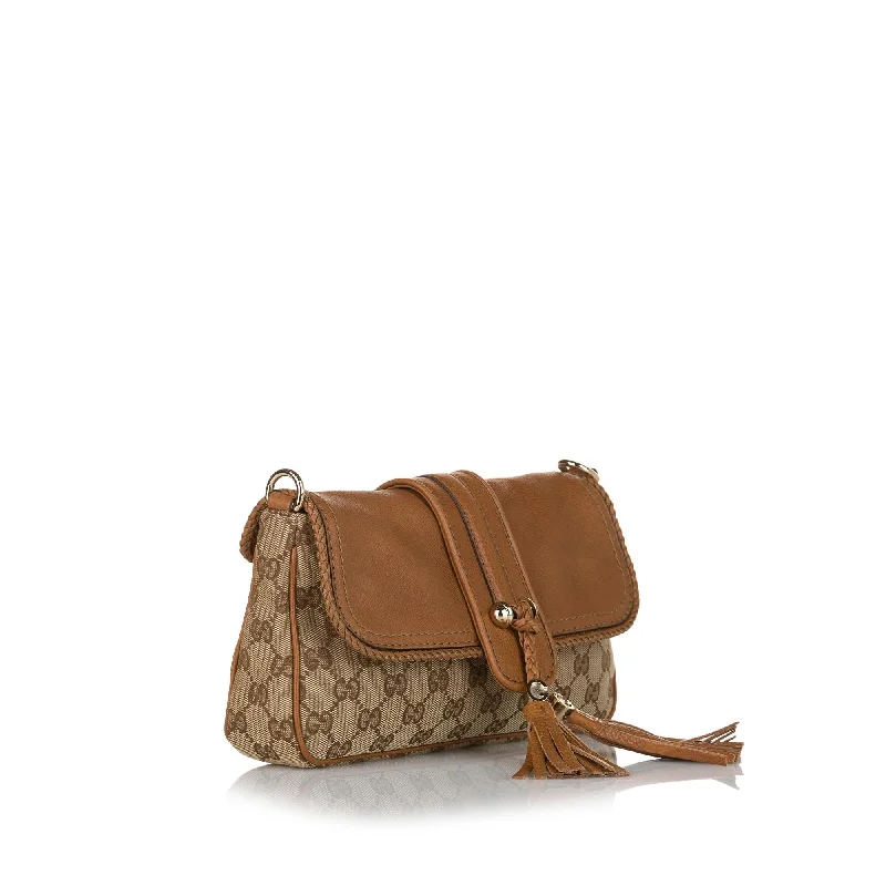 Women Gucci bags with a front - flap pocket for quick - access itemsGucci GG Canvas Marrakech Evening Baguette (33611)