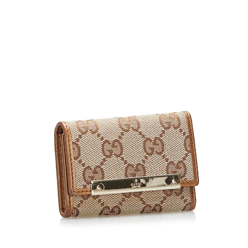 Gucci handbags for women with a patent - leather finishGucci GG Canvas Key Holder (37778)