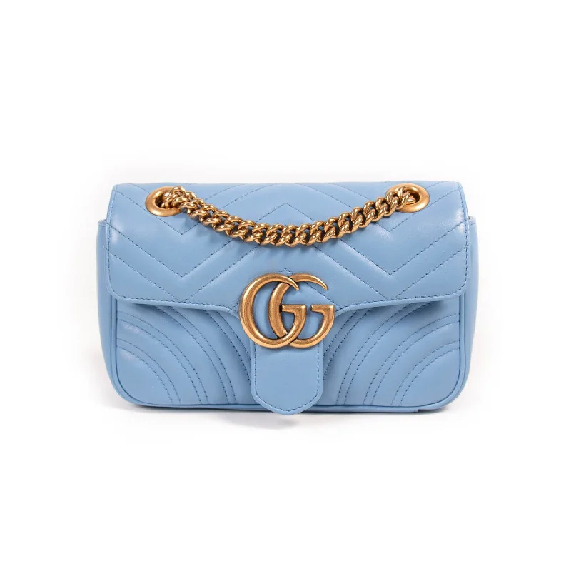 Ladies Gucci shoulder bags with a tassel decorationGucci GG Marmont Matelassé Mini Bag