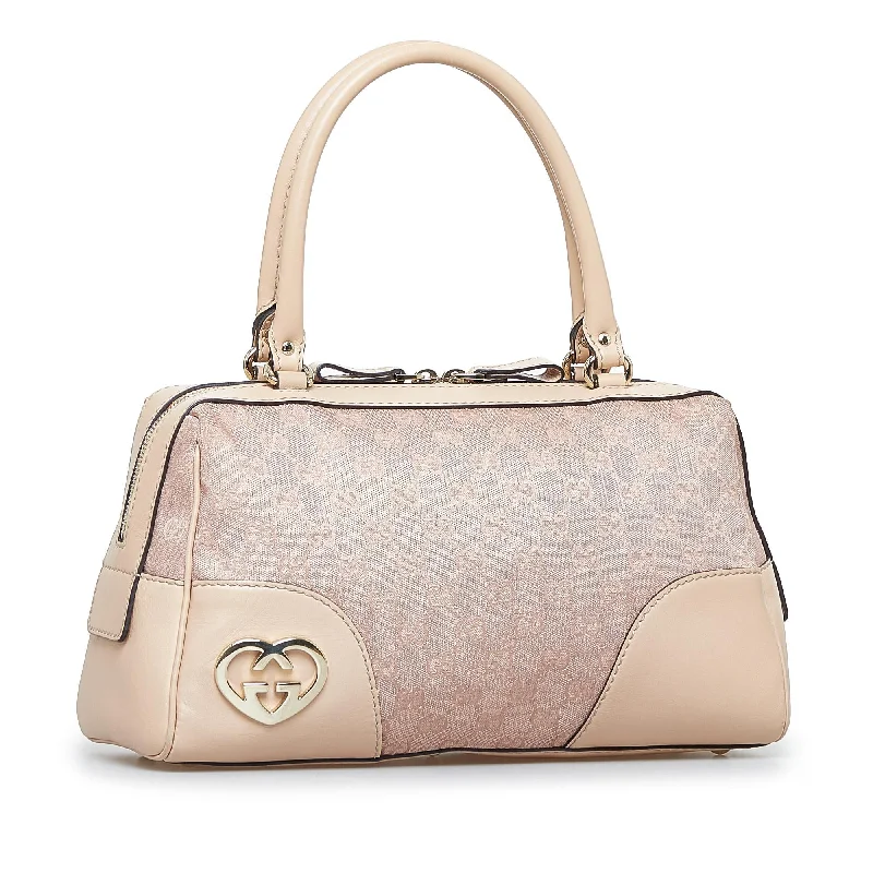 Women Gucci bags with a snap - button closure and a decorative charmGucci GG Canvas Lovely Handbag (qt1rYM)