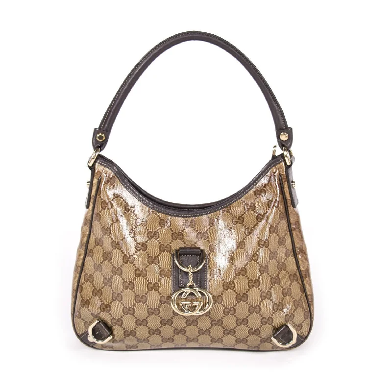 Gucci tote bags for women with a printed Gucci logoGucci GG Patent Hobo