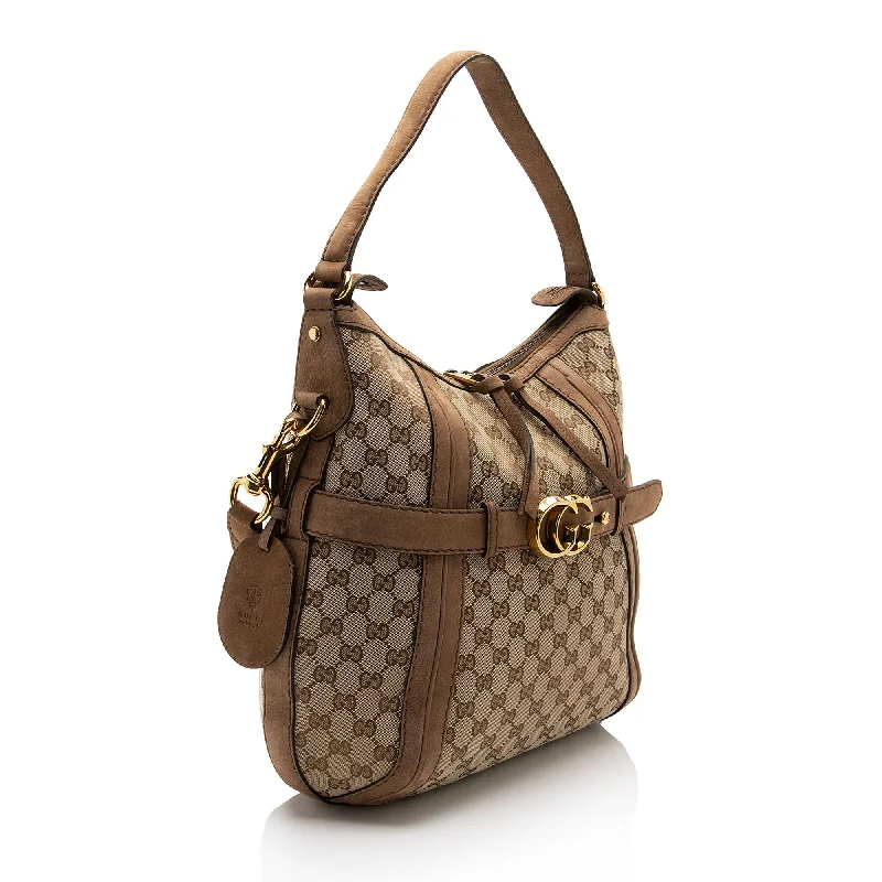 Women Gucci bags with a snap - button closure and a decorative charmGucci GG Canvas Suede Running Medium Hobo (FV9sin)