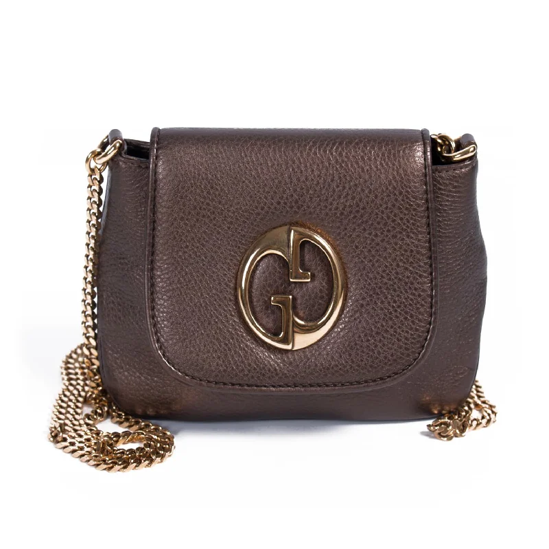 Gucci handbags for women with a metal - framed claspGucci 1973 Mini Crossbody Bag