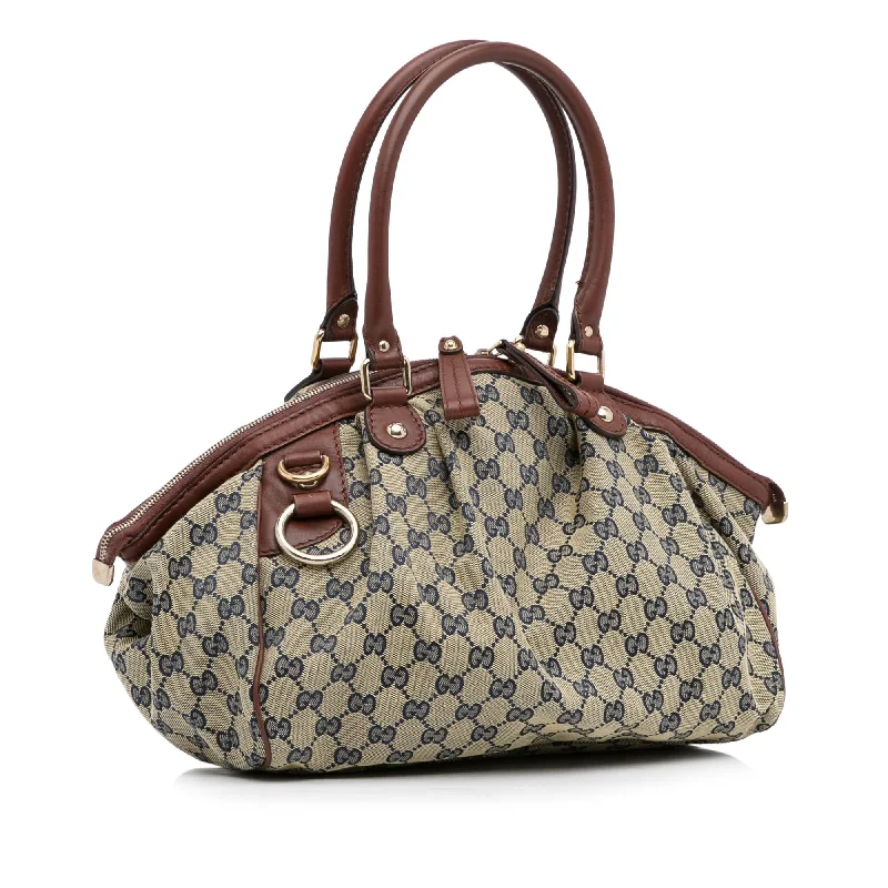 Women Gucci backpacks with a luxurious leather finishGucci GG Canvas Sukey (341MXF)