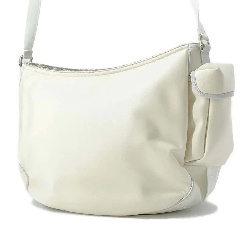 Christian Dior backpacks with a sleek, minimalist silhouetteDior Sacai collaboration saddle soft bag White 1ADHO029USG Nylon Leather