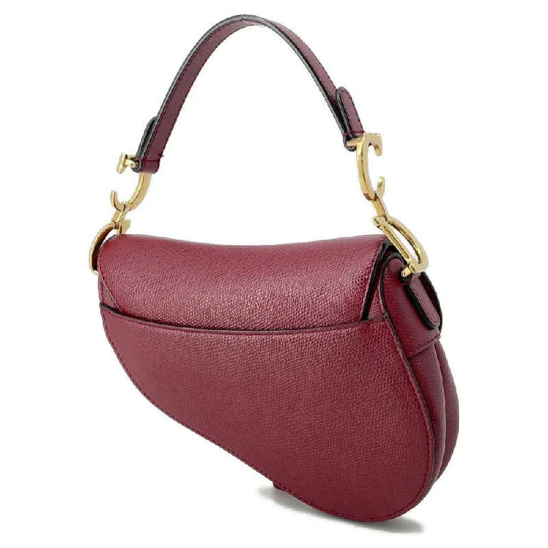 Christian Dior Saddle bags with a studded trim for a bold lookDior Saddle bag Red M0447CWVG Leather Size Mini