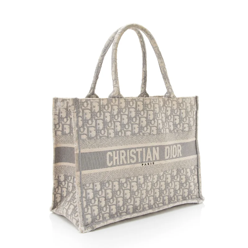 Christian Dior handbags with a snap - button closure and a decorative buckleDior Oblique Small Book Tote (lJwKKA)