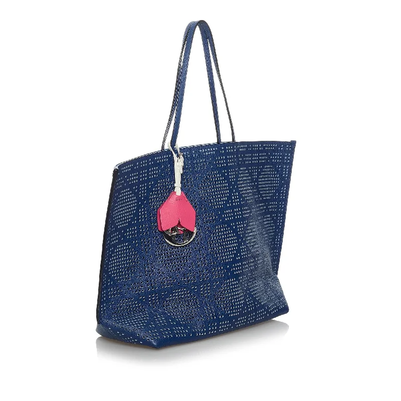 Christian Dior bags with a side - pocket for holding a water bottleDior Perforated Dioriva Leather Tote Bag (34968)