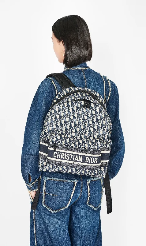 Christian Dior handbags with a snap - button closure and a decorative buckleDior Travel Backpack Blue Dior Oblique Jacquard