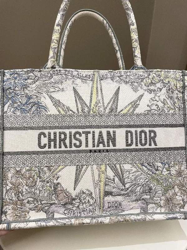 Trendsetting Christian Dior crossbody bags with a colorful strapDior Reve d'Infini Book Tote Ivory / Multicolor Embroidery