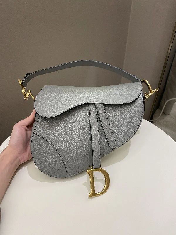 Christian Dior handbags with a snap - button closure and a decorative buckleDior Saddle Bag Gray Grained