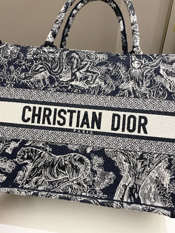 Christian Dior bags with a quilted pattern and gold - toned hardwareDior Toile de Jouy Reverse Book Tote Blue / Ecru Embroidery