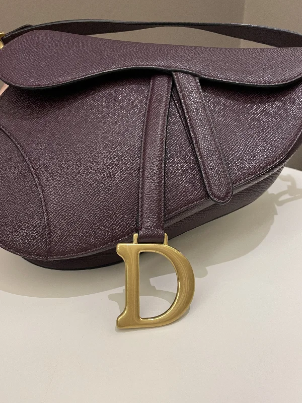 Contemporary Christian Dior handbags with a unique shapeDior Saddle Bag Amaranth Grained Calfskin